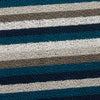 Chilewich Shag indoor/outdoor mats are made by tufting custom extruded yarns as loops onto a primary backing and then binding them onto a hardworking vinyl that could weather any storm outdoors and provides functionality underfoot indoors. Marine 200128-00. UPC 0667880915789.