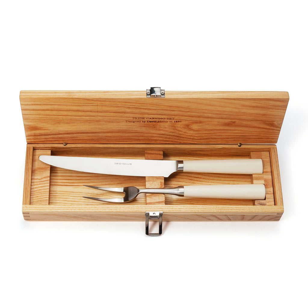 David Mellor Pride carving set. SKU 2518310. Expertly hand finished with ivory coloured handles. Super-sharp high carbon stainless steel blade has been ice-hardened to minus 80ºc.