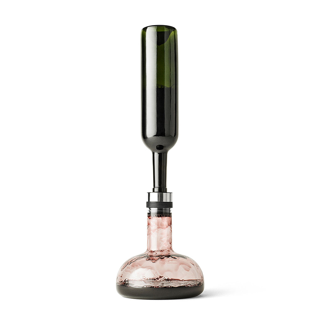 Serve wine in the original bottle.  The New Norm Wine Breather makes it easy to serve aerated, ready to drink wine directly from the original bottle, enabling the bottle to tell its personal story. The secret is found in the unique wine breather invented by wine expert Peter Ørsig.