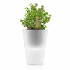 Eva Solo Selfwatering Herb Pot 13cm in Chalk White. SKU 568203. UPC 5706631006675. All you have to do is to remember to look at the pot every now and then and refill the water reservoir as required. And it only takes a moment to see whether the reservoir needs water. This way, plants have optimum growing conditions, which is good for the plant – and for you!