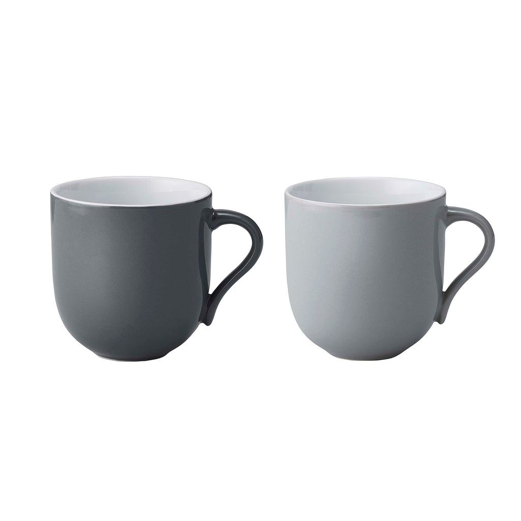 Stelton Emma mug 0.3 l. 2 Pcs By HolmbäckNordentoft Danish Modern 2.0 Enjoy an aromatic cappuccino or cup of tea in these elegant cups from the Emma collection. This elegant cup is made from glazed stoneware in a set of grey tone-in-tone colours. The cup holds 380 ml each. Item number: X-207-1 Length: 9 cm Height: 9.5 cm Width: 12.5 cm.