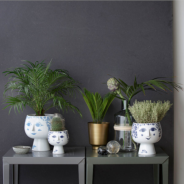 Bjorn Wiinblad's Juliane flowerpot plant holders lend plants and herbs a joyfully colorful frame.