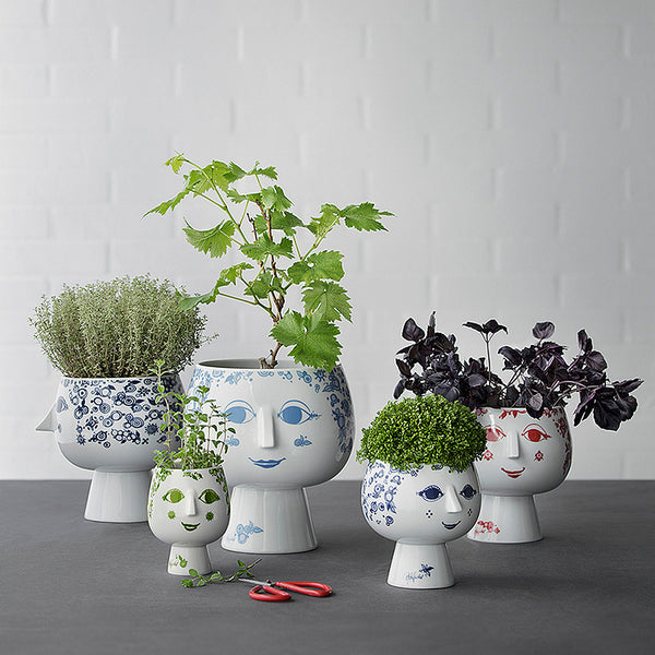 The Juliane flowerpot plant holders feature colorful motifs of well-known Bjørn Wiinblad feminine forms.