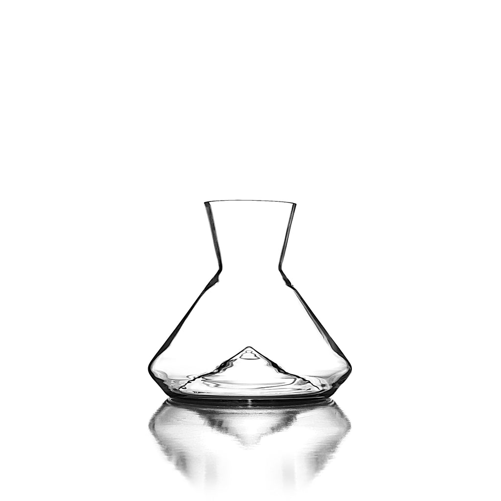 Monti-Mini Decanter by Sempli. Measurements: Height 6” Diameter 6.5.” Capacity:  25.3 oz. This ultra clear, lead-free crystal decanter uses a design that’ll steal the show at your next dinner party, and noticeably change your pours for the better.