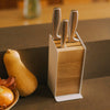APTO Slot Knife Block - Steel + Wood. Universal slots fit most common knife sizes, keeping your collection organized and always within reach. The maximum blade length is 8.5 inches (21.5 cm) for the front slot, 8.8 inches (22 cm) for the middle slot, and 9.3 inches (23.5 cm) for the back slot.