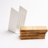 A universal knife block with slots for most knife sizes, removable components for easy cleaning, and a warm wood and steel design for any kitchen. The wood pieces are easily removable for cleaning with a soft, damp cloth.