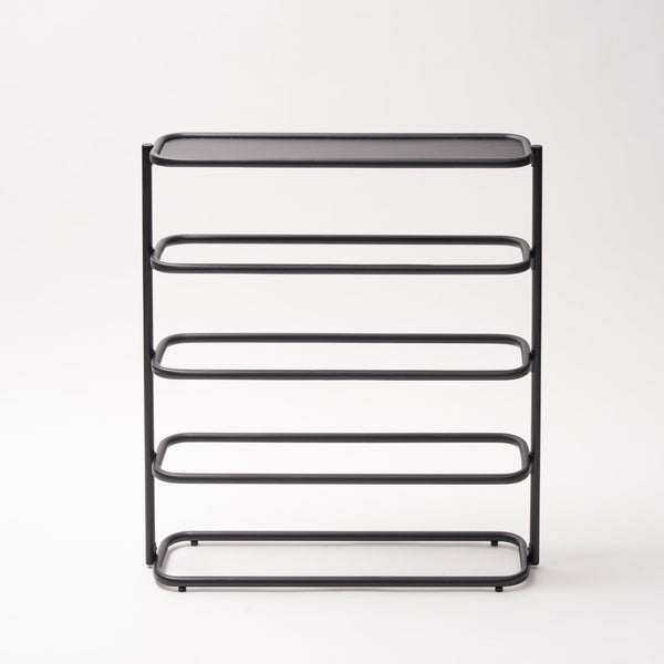 Apto Obround Shoe Rack Tall Steel Black is a modern two-in-one shoe rack and entryway table. Stylish storage for your shoes and everything you need to get out the door on time. With room for up to 12 pairs of shoes, this rack is perfect for keeping your go-to shoes by the door or putting your favorite pairs on display. Designed with your home in mind. The bottom of each shoe rack is outfitted with silicone footers to protect your floor from any damage. SKU 10487.