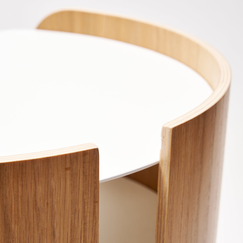Balances modern steel surfaces with stylish molded plywood. A clean, modern side table that complements any room. Perfect height for beside the bed or next to your favorite chair. Sleek design with practical storage. Quality materials for lasting beauty.