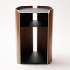 Apto Contour Side Table in walnut plywood and black powder-coated steel. SKU 10801. Bring style and function to any room with this modern three-tier steel and wood side table. Designed with your lifestyle in mind. The table features an opening in the back for easy cable management and charging. Balances modern steel surfaces with stylish molded plywood.