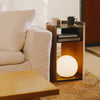 APTO Side Table - Steel + Wood - Black. SKU 10801. Bring style and function to any room with this modern three-tier steel and wood side table. Designed with your lifestyle in mind. The table features an opening in the back for easy cable management and charging. Balances modern steel surfaces with stylish molded plywood.