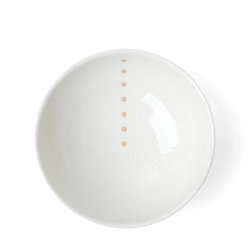 Satin White Dots 7-1/4" Bowl. SKU 140-032. UPC 846682040220. White glazed bowls with beige circle design. 7-1/4" diameter x 3-3/8"h. Dishwasher/microwave safe. Ceramic. Made in Japan.