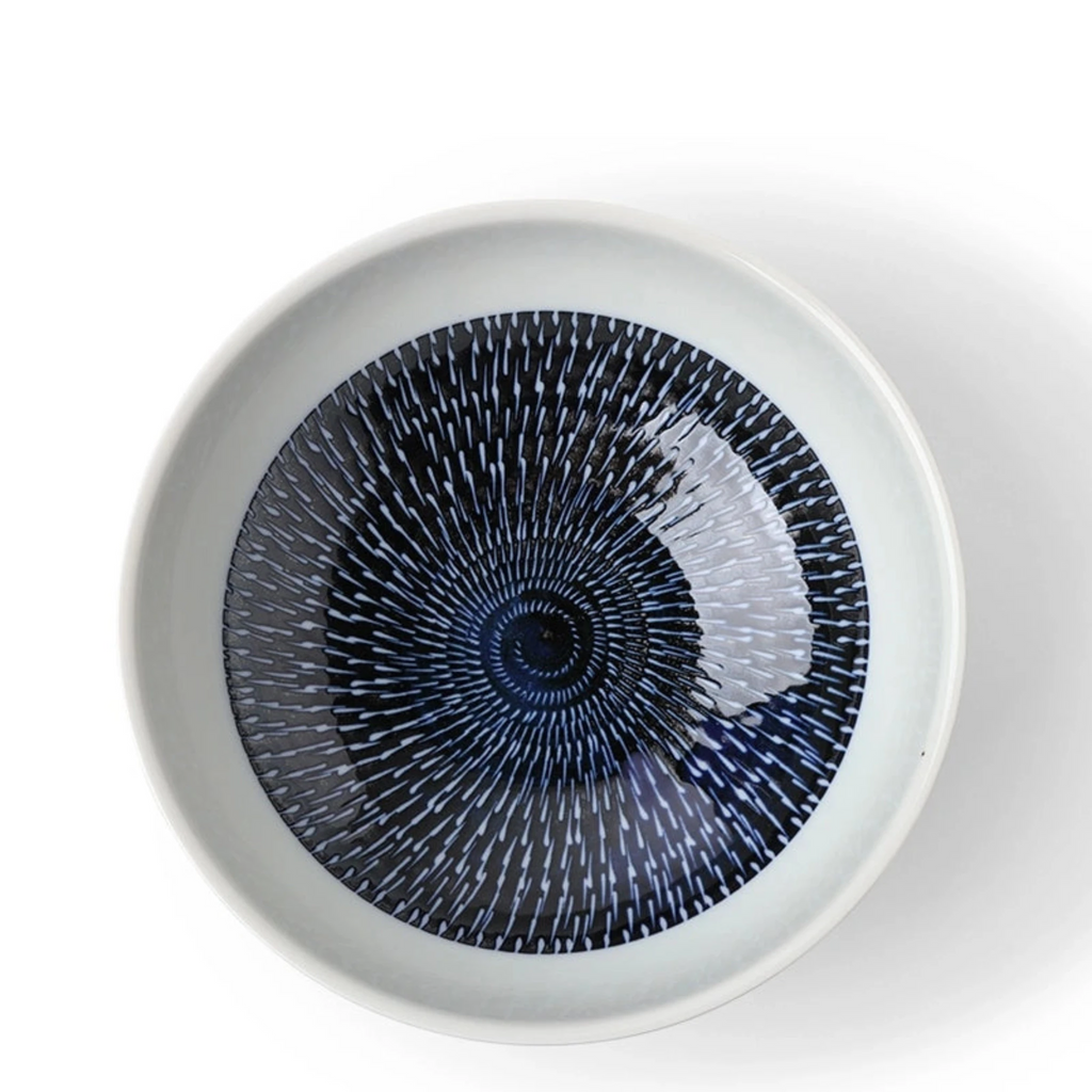 Indigo Tobi Kanna Bowl 8-3/8" diameter. Satin Indigo Tobi Kanna design serving/noodle bowl. SKU 140-060. UPC 846682045621. 8-3/8" diameter x 3-1/4"h. 40 oz. capacity. Dishwasher/microwave safe. Ceramic. Made in Japan.