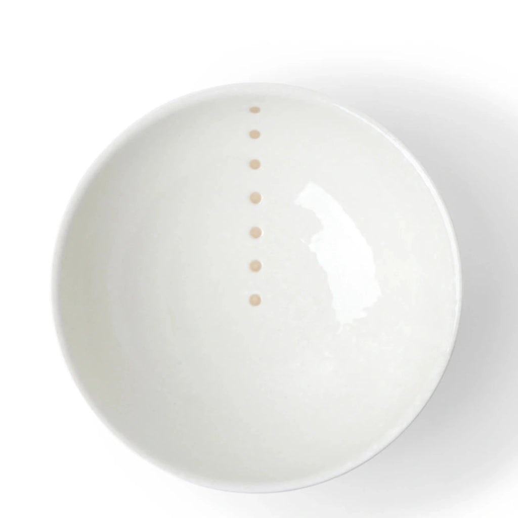 Satin White Dots 8-3/8" Bowl. SKU 140-062. UPC 846682045614. Cream glazed bowls with beige circle design. 8-3/8" diameter x 3-1/4"h. Dishwasher and microwave safe. Ceramic. Made in Japan.