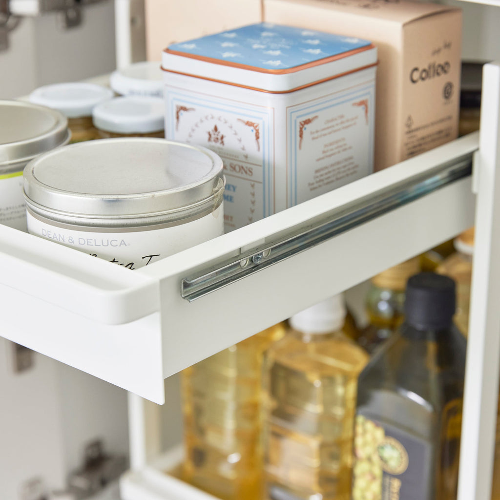 This 2 tier kitchen storage rack is the key to making the most of under-sink storage! Put everything within reach with this rack's pull-out shelves.