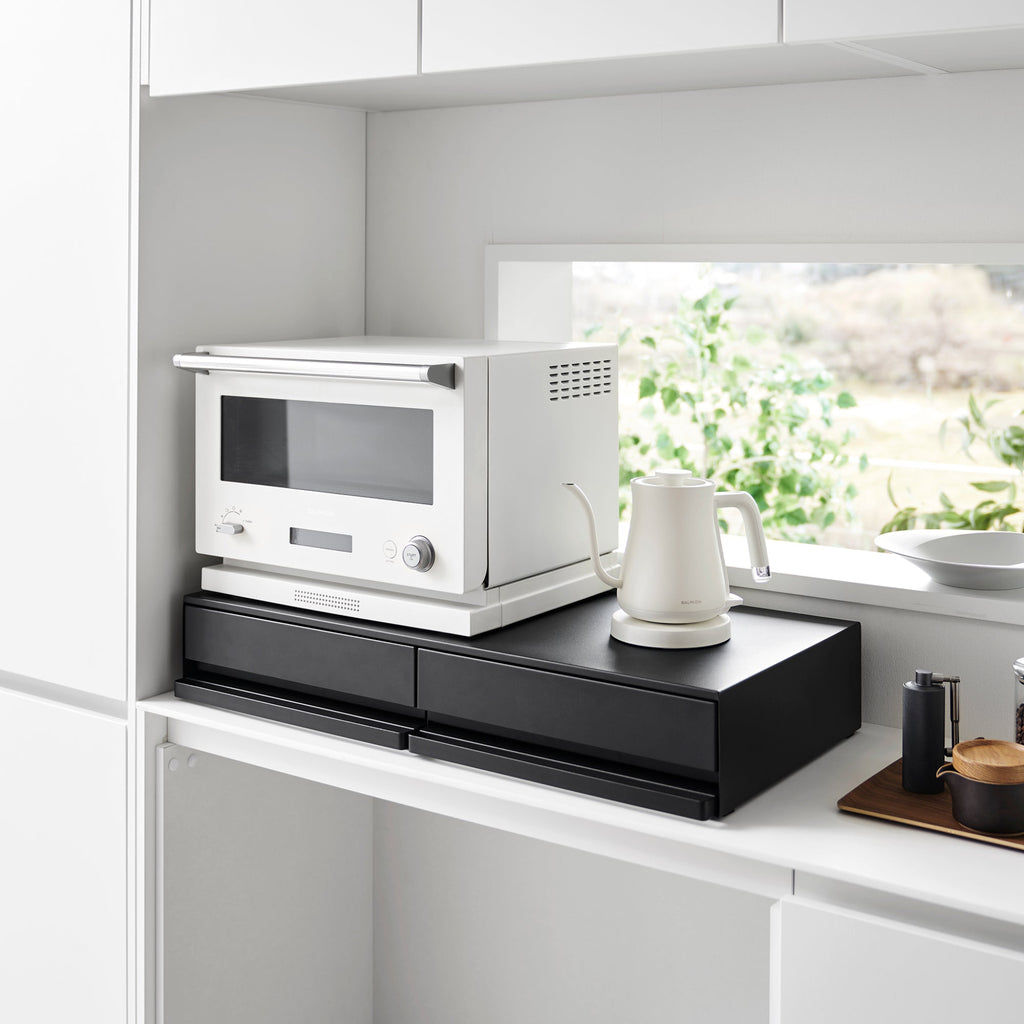 Two-way storage rack with interchangeable drawer and shelf position. The drawer can be pulled out up to 8 inches, while the shelf can be extended up to approximately 9.8 inches. Drawer interior dimensions are approximately 3.5 inches in height, providing excellent storage capacity.