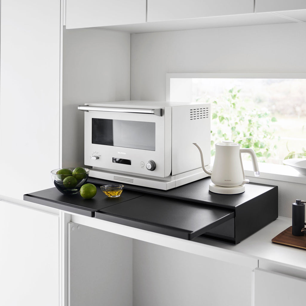 Pull-out shelf can be installed above or below the drawer