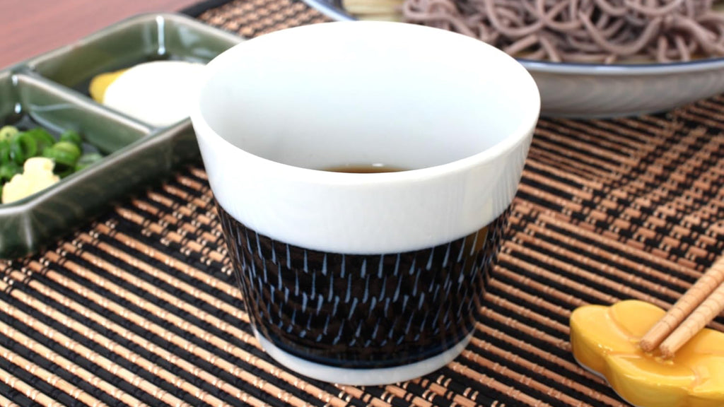 Tobikanna Blue Soba Cup. This cup is traditionally used as a soba dipping bowl but it can also be used for any type of dipping sauce, side dressing, snacks, candy, spices or even as a teacup. Mix and match with other coordinating soba cups.
