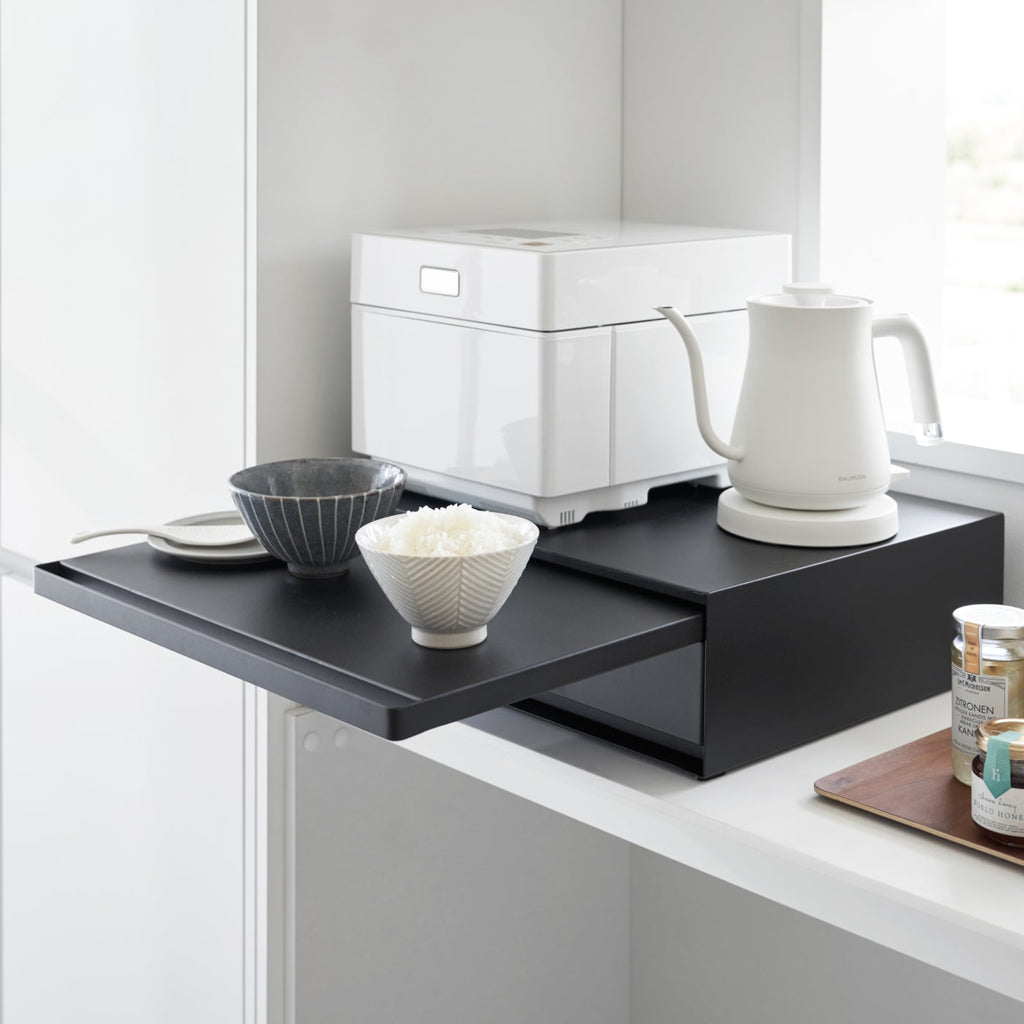 This organizer creates space and convenience in the kitchen. Small kitchen game changer. Place larger items on top and enjoy a whole extra drawer of storage for dish towels, potholders, tea trinkets—you name it! 