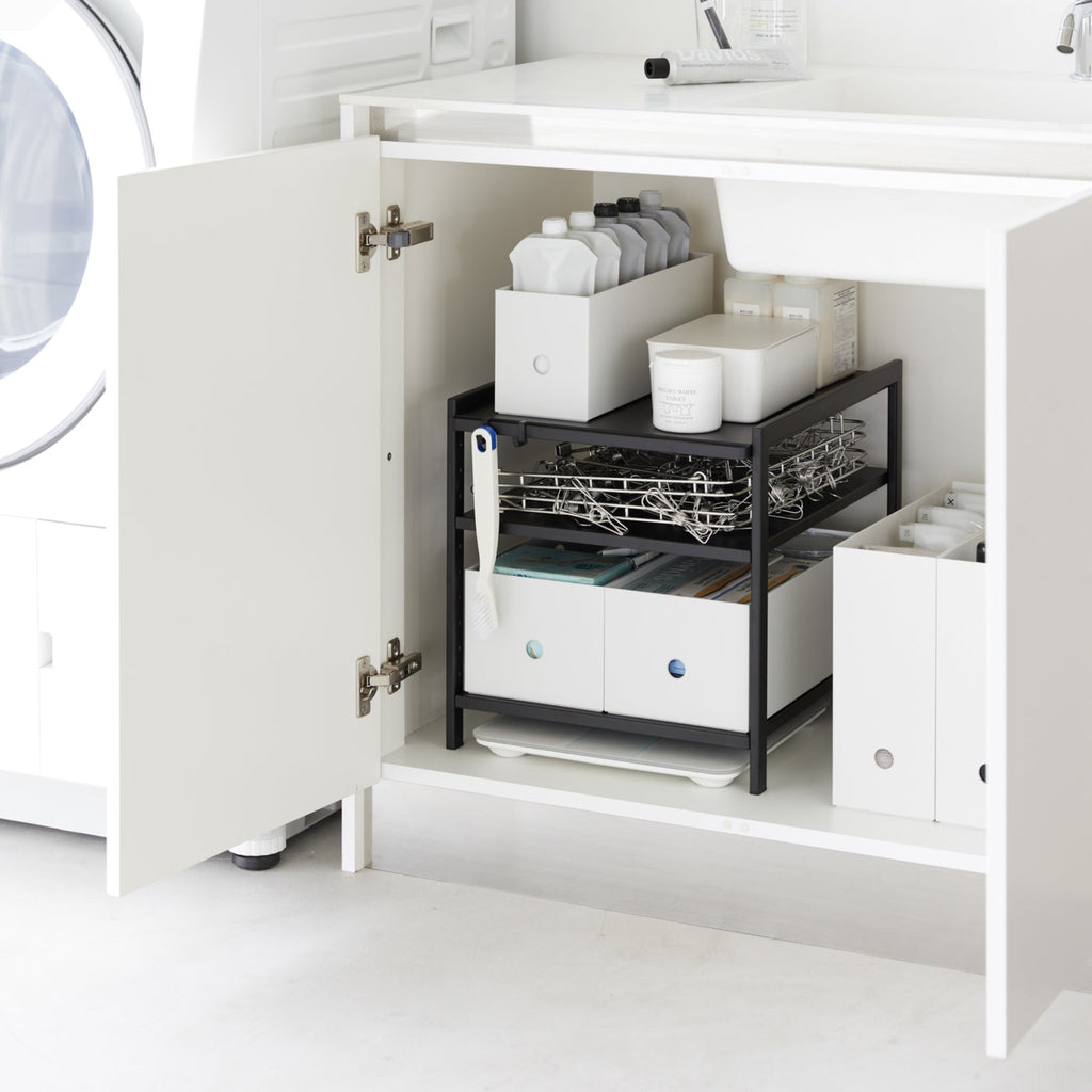 Sturdy steel construction. An effective solution to keep your cleaning tools in check under the kitchen sink, and even bathroom cabinets.