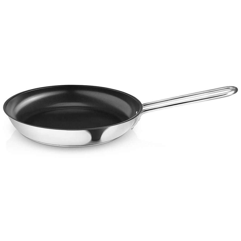 Eva Trio STAINLESS STEEL FRYING PAN - 24 CM - CERAMIC SLIP-LET®️ NON-STICK. SKU 202511. UPC/EAN: 5706631068062. Now Eva Solo is introducing a frying pan in the stainless steel series with ceramic coating. There is a ILAG Slip- Let® ceramic coating which can withstand very high temperatures, up to 400 ° C. The coating is therefore ideal for roasting meat and making the perfect crust.
