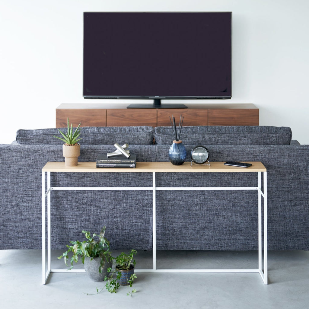 The long design makes this table an ideal addition for the area behind your sofa, which is prone to becoming dead space. Add some flair with indoor plants or decor items while also providing a convenient ledge for your remote controls, books, and other living room items.