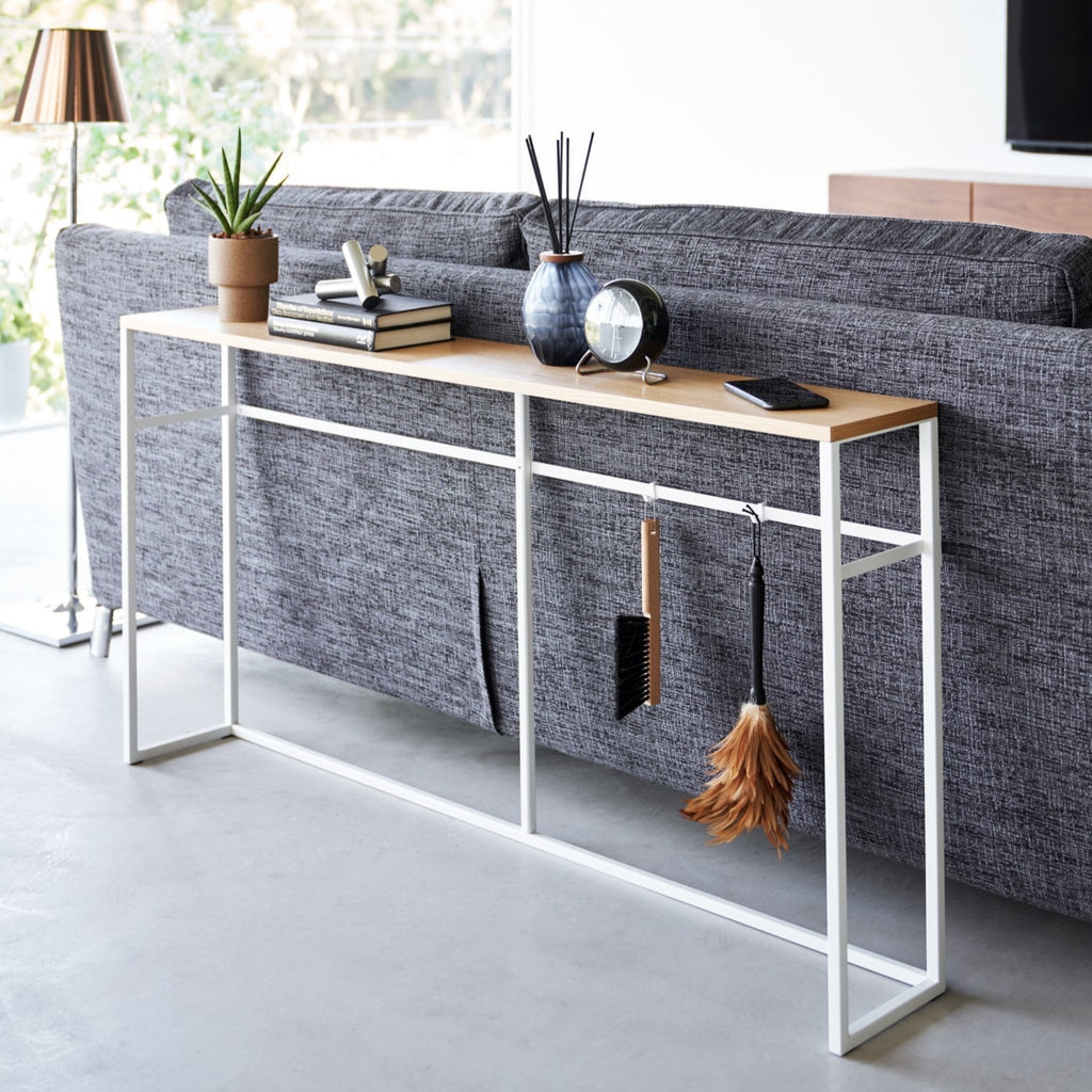The shelf-less, open version features four storage hooks for hanging small accessories.
