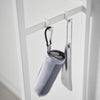 Keep your living room or entryway essentials on the table, umbrellas and other hanging items on the hooks, and perhaps top it off with some decor items to accentuate your space.