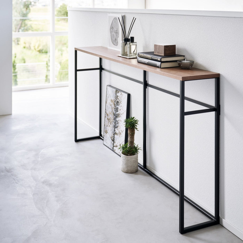 At just 8.1 inches deep, this slim table is a great addition for hallways, entryways, or any other elongated area in your home. Create a focal point with a touch of decor and keep your out-the-door essentials in one spot.