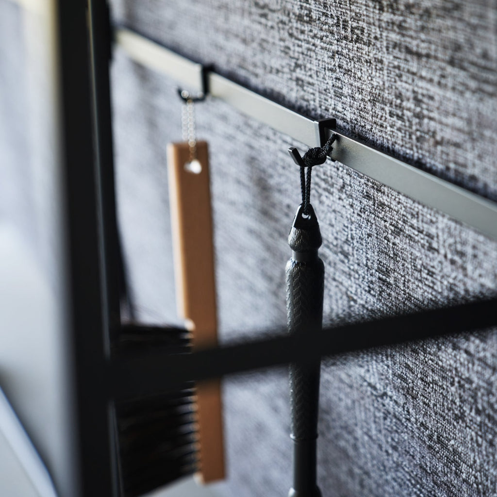 The shelf-less, open version features four storage hooks for hanging small accessories.