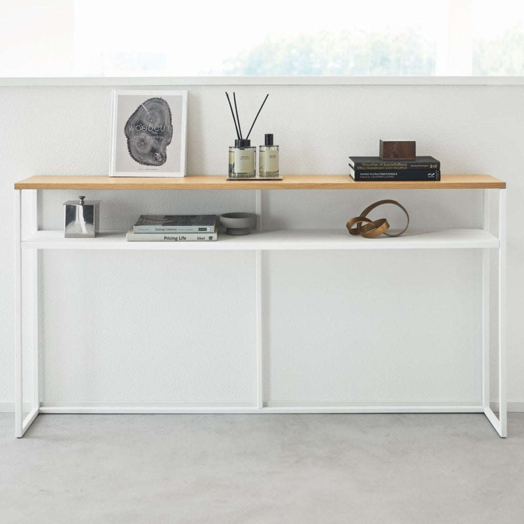 The long design makes this table an ideal addition for the area behind your sofa, which is prone to becoming dead space. Add some flair with indoor plants or decor items while also providing a convenient ledge for your remote controls, books, and other living room items.