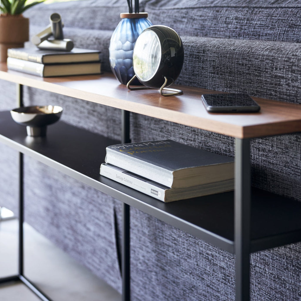 Shelf version provides extra storage for books, remote controls, and other knickknacks.