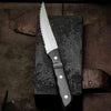 Old Farmer Micarta Black Steak knife XL. SKU 20349. Old Farmer is a beautiful and rustic stainless steel steak cutlery. Old Farmer Black has a high-quality POM plastic handle, while Old Farmer Classic features a pressed rosewood handle. The cutlery is designed by Bent Severin, an industrial designer who worked with perfection in every material. He was considered one of Denmark’s leading sculptors and designers with significant influence in the creative world.