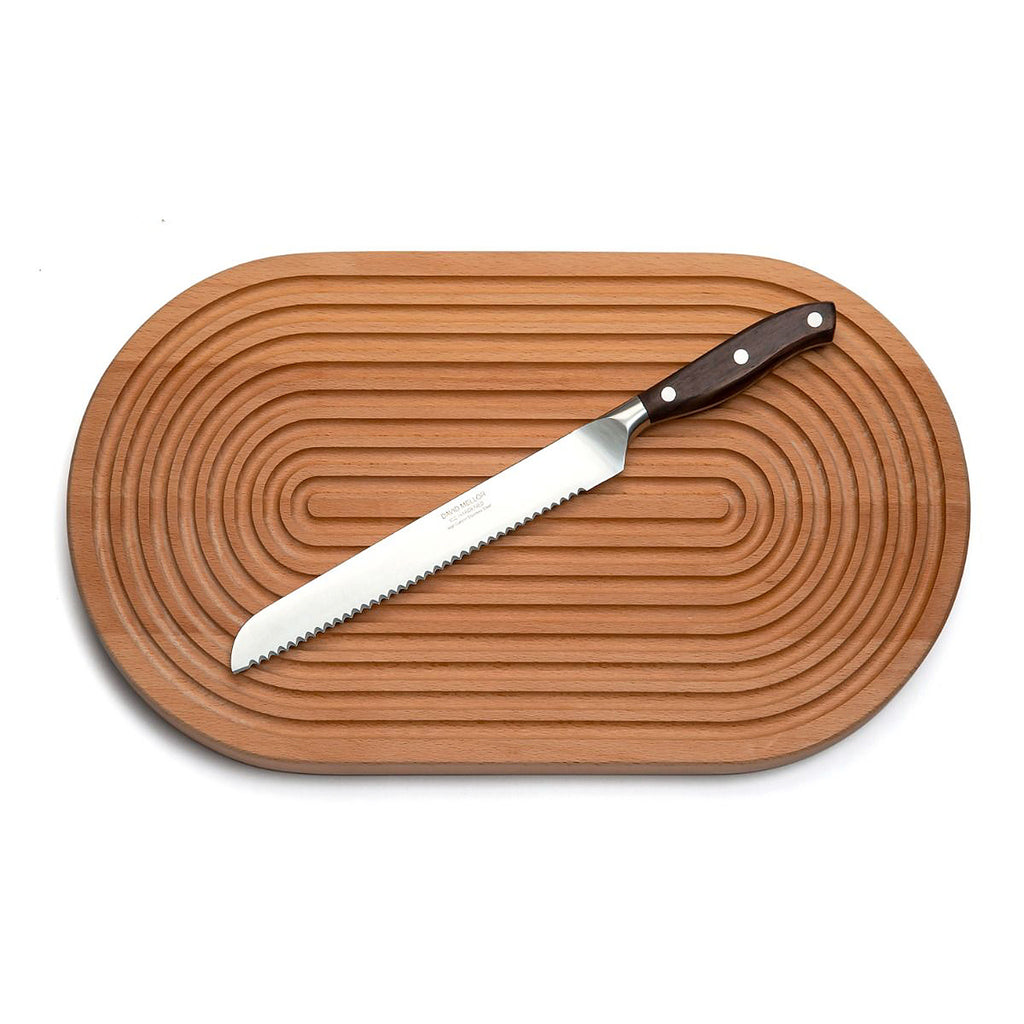 Grooved breadboard 44cm. SKU 2450310. Our own-brand cutting boards are handmade in wood from sustainable sources by small specialist craft workshops. These are really top quality products.

Sculptural design with milled grooves to contain crumbs. European beech with non-slip feet.
