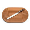Grooved breadboard 44cm. SKU 2450310. Our own-brand cutting boards are handmade in wood from sustainable sources by small specialist craft workshops. These are really top quality products.

Sculptural design with milled grooves to contain crumbs. European beech with non-slip feet.