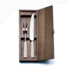 David Mellor Design Pride carving set in walnut box. SKU 2518325.New edition of David Mellor’s famous ‘Pride’ carving set first designed in 1956. Expertly hand finished with ivory coloured handles. Super-sharp high carbon stainless steel blade has been ice-hardened to minus 80ºc. Comes in a solid walnut case with hinged lid and clasp.