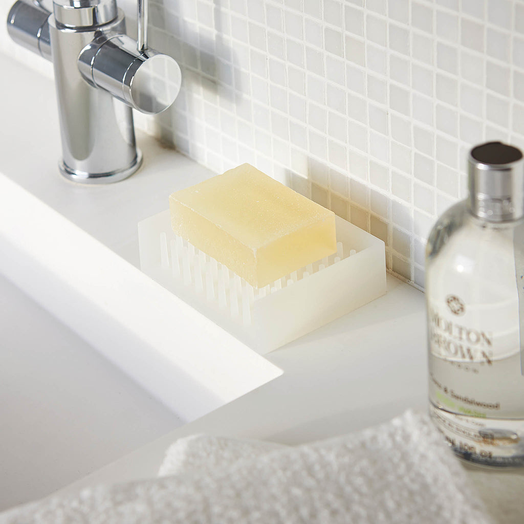 This clever tray will hold your bar of soap aloft like it’s floating on a cloud. Meanwhile, the slanted base trickles water back into your sink. 