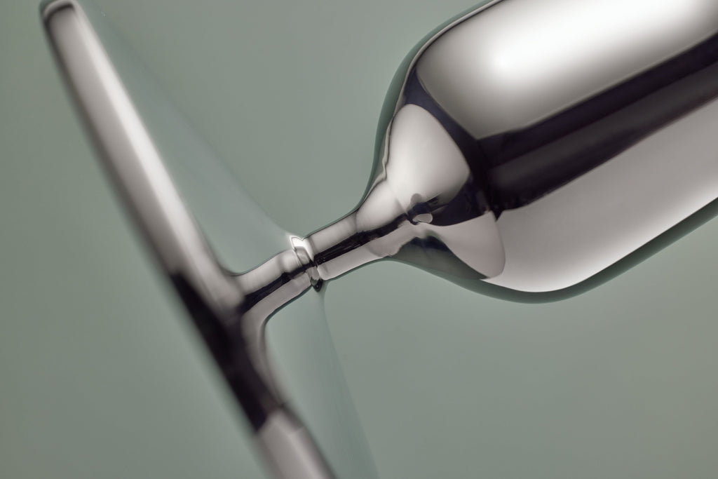 Made from recycled 18/10 stainless steel (SS304), this candlestick is part of the Dorotea collection - an homage to the natural area surrounding the small village of Dorotea. Here, ice has sculpted a landscape of mountains, valleys, and expansive open spaces, creating soft, fluid shapes that flow seamlessly into one another. This often-overlooked transition is where the true spirit of the design comes to life - subtle, yet full of depth and discovery. 