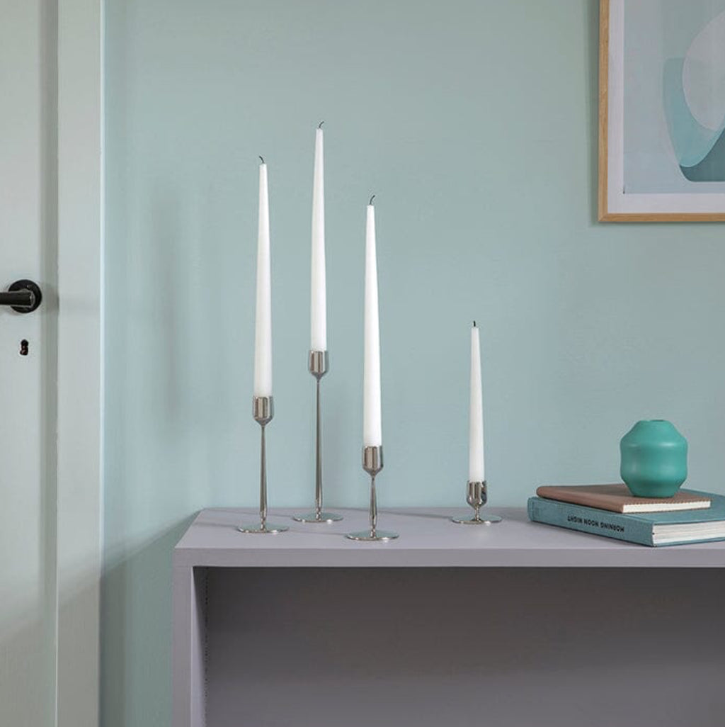 Made from recycled 18/10 stainless steel (SS304), this candlestick is part of the Dorotea collection - an homage to the natural area surrounding the small village of Dorotea. Here, ice has sculpted a landscape of mountains, valleys, and expansive open spaces, creating soft, fluid shapes that flow seamlessly into one another. This often-overlooked transition is where the true spirit of the design comes to life - subtle, yet full of depth and discovery. 