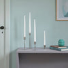 Made from recycled 18/10 stainless steel (SS304), this candlestick is part of the Dorotea collection - an homage to the natural area surrounding the small village of Dorotea. Here, ice has sculpted a landscape of mountains, valleys, and expansive open spaces, creating soft, fluid shapes that flow seamlessly into one another. This often-overlooked transition is where the true spirit of the design comes to life - subtle, yet full of depth and discovery. 