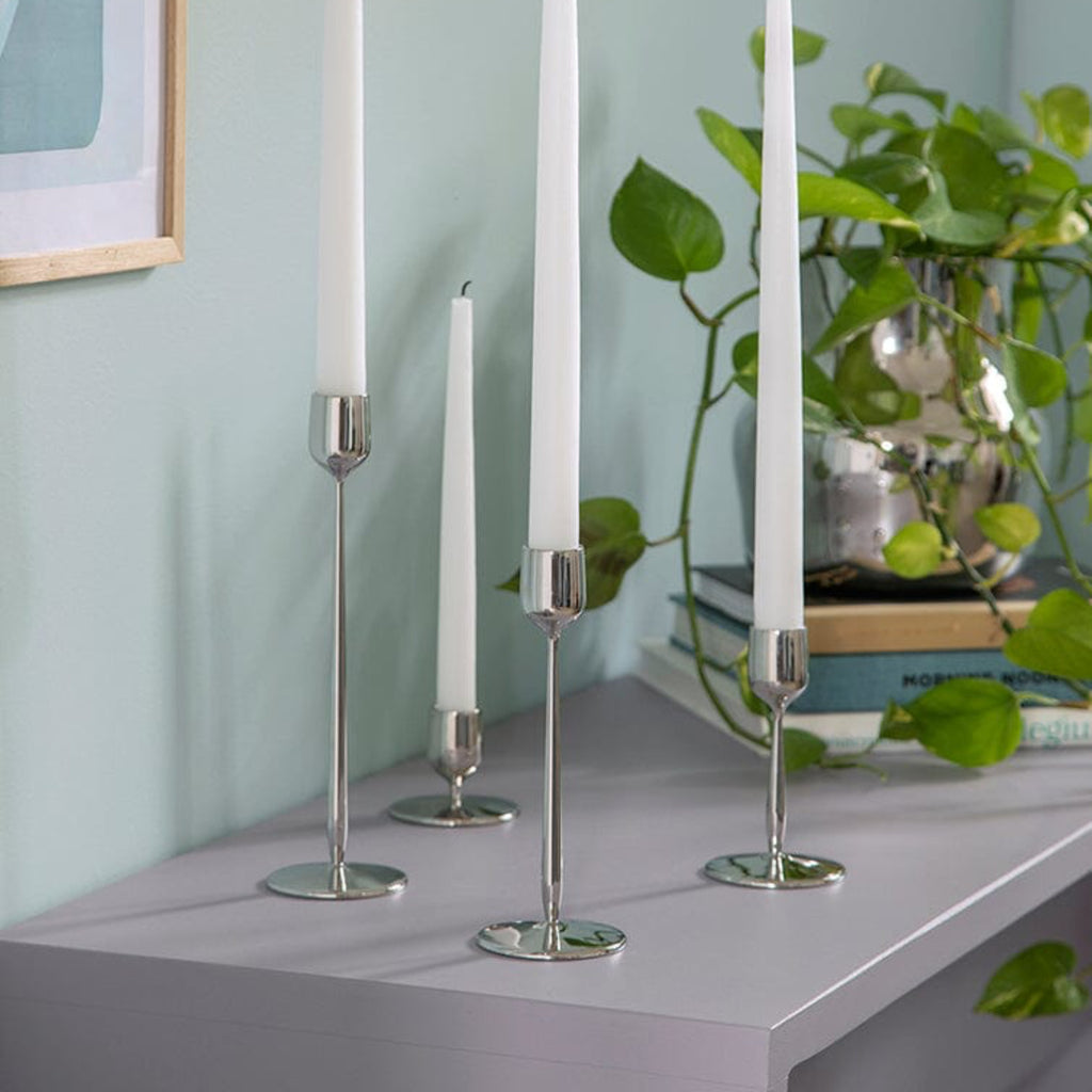 Made from recycled 18/10 stainless steel (SS304), this candlestick is part of the Dorotea collection - an homage to the natural area surrounding the small village of Dorotea. Here, ice has sculpted a landscape of mountains, valleys, and expansive open spaces, creating soft, fluid shapes that flow seamlessly into one another. This often-overlooked transition is where the true spirit of the design comes to life - subtle, yet full of depth and discovery. 