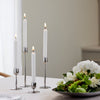 Made from recycled 18/10 stainless steel (SS304), this candlestick is part of the Dorotea collection - an homage to the natural area surrounding the small village of Dorotea. Here, ice has sculpted a landscape of mountains, valleys, and expansive open spaces, creating soft, fluid shapes that flow seamlessly into one another. This often-overlooked transition is where the true spirit of the design comes to life - subtle, yet full of depth and discovery. 