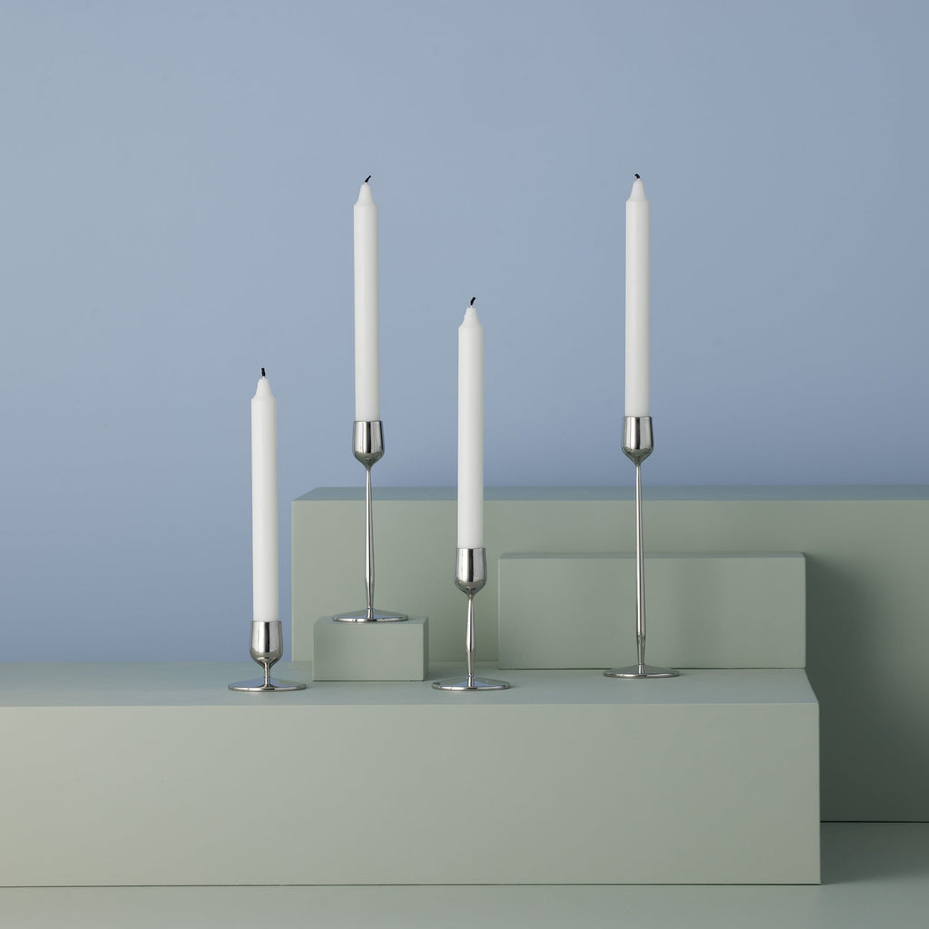 Made from recycled 18/10 stainless steel (SS304), this candlestick is part of the Dorotea collection - an homage to the natural area surrounding the small village of Dorotea. Here, ice has sculpted a landscape of mountains, valleys, and expansive open spaces, creating soft, fluid shapes that flow seamlessly into one another. This often-overlooked transition is where the true spirit of the design comes to life - subtle, yet full of depth and discovery. 