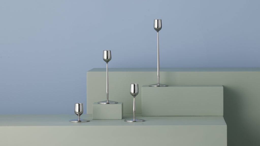 Made from recycled 18/10 stainless steel (SS304), this candlestick is part of the Dorotea collection - an homage to the natural area surrounding the small village of Dorotea. With its minimalist and organic form, the Dorotea collection blends Nordic tradition with artisanal craftsmanship on a global scale.