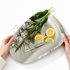 This dish, made of polished 18/10 stainless steel, is part of the Dorotea collection - an homage to the natural beauty surrounding the small village of Dorotea. Shaped by ice over centuries, the region's landscape of mountains, valleys, and wide-open spaces has inspired soft, fluid forms that seamlessly flow together. 