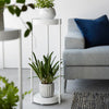 This two-tier plant stand can accommodate up to two potted plants: place a larger plants on the bottom and smaller plants on the top tier. The vertical design allows for a stylish and compact way to display your indoor greenery. Plus, the three-pillar design creates adequate spacing between poles so you can easily switch out plants as you please.