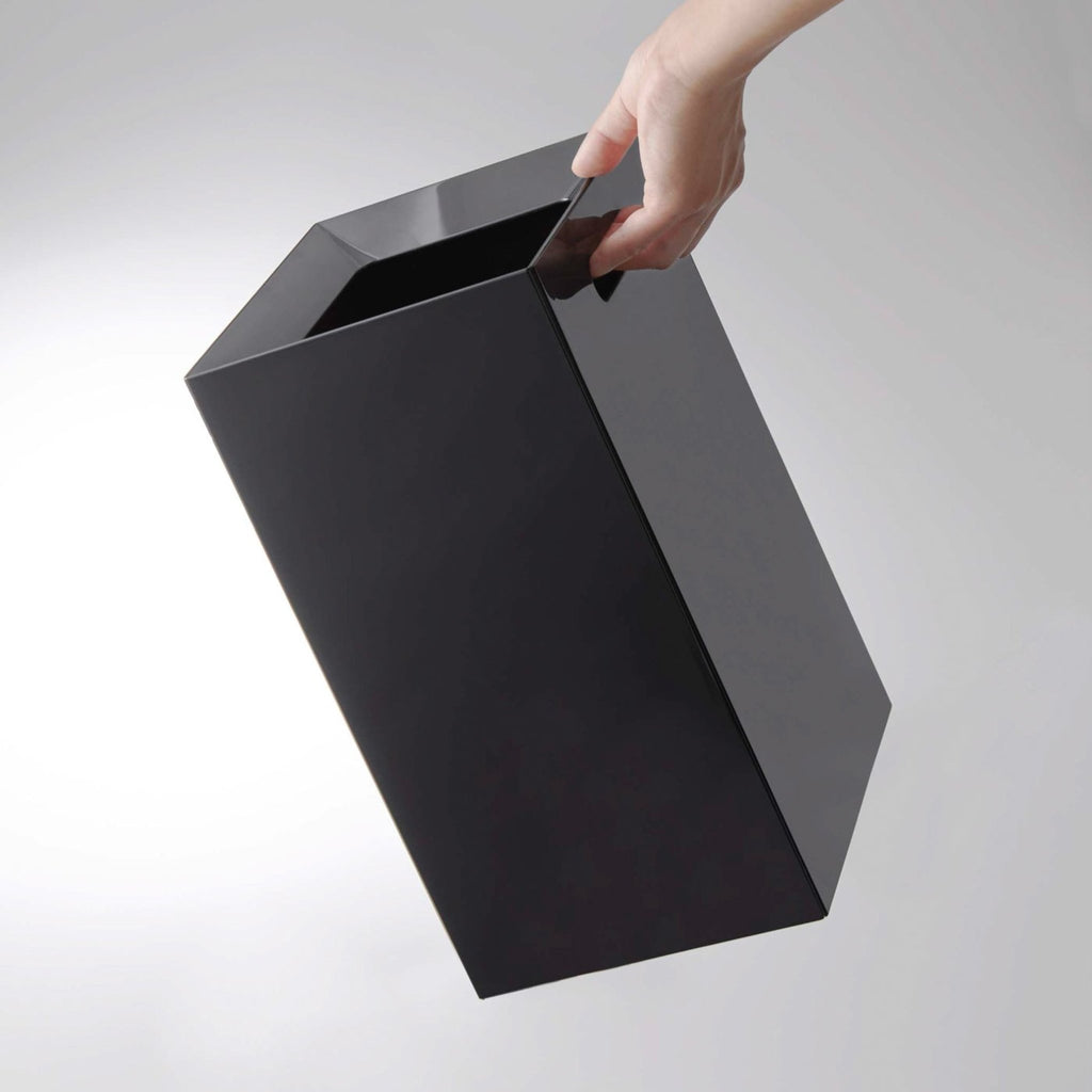 Not only will the liner be secure and nearly invisible, but replacing the trash just got even easier thanks to the handle on this waste bin. This wastebasket really did think of everything.