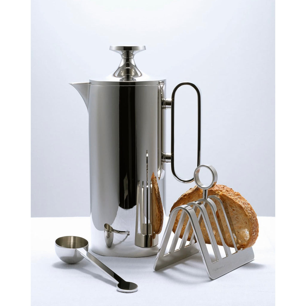 This elegant stainless-steel tableware, designed by Corin Mellor and perfectly in keeping with the company’s long tradition of fine metalwork design was recently introduced. The range is an extension of his existing superb cafetière design, to include a matching teapot, cream jug and sugar pot with lid. Each item is flawlessly manufactured and highly polished, with the option of a titanium-coated grey finish on the knob and handle.