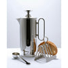 This elegant stainless-steel tableware, designed by Corin Mellor and perfectly in keeping with the company’s long tradition of fine metalwork design was recently introduced. The range is an extension of his existing superb cafetière design, to include a matching teapot, cream jug and sugar pot with lid. Each item is flawlessly manufactured and highly polished, with the option of a titanium-coated grey finish on the knob and handle.