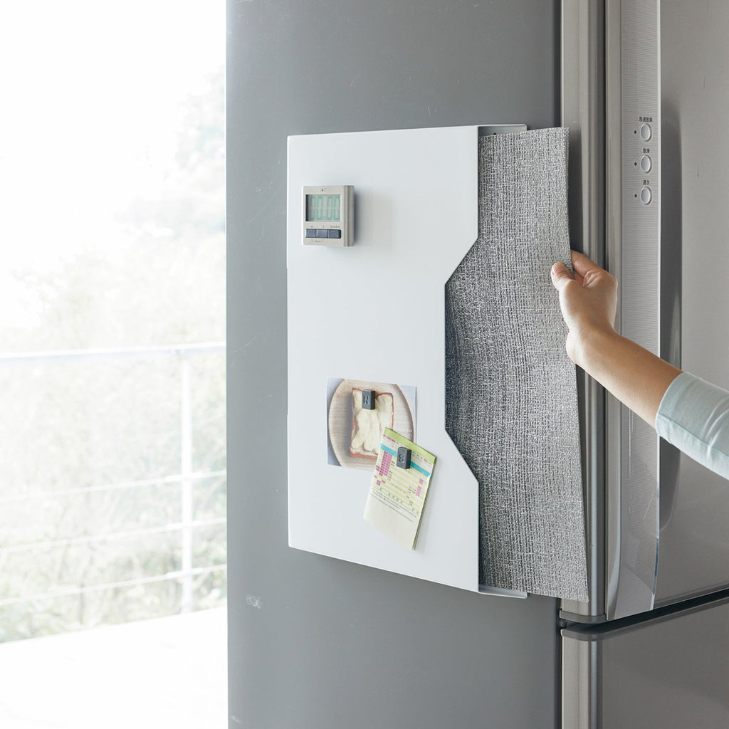It’s slim and magnetic, perfect for attaching to the inside of a cabinet drawer or the side of a fridge so your mats are clean and dinner-ready. 