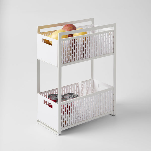 Yamazaki Home Tower Two-Tier Cabinet Storage Basket White SKU 5218. Optimize under-sink space with our 2-tiered storage basket. Keep your essentials neatly arranged while making the most of valuable space.